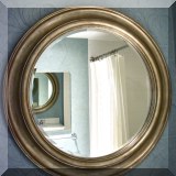 D06. Round silvertone beveled mirror. 34”h 